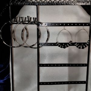 Silver toned earrings and 3 bracelet set